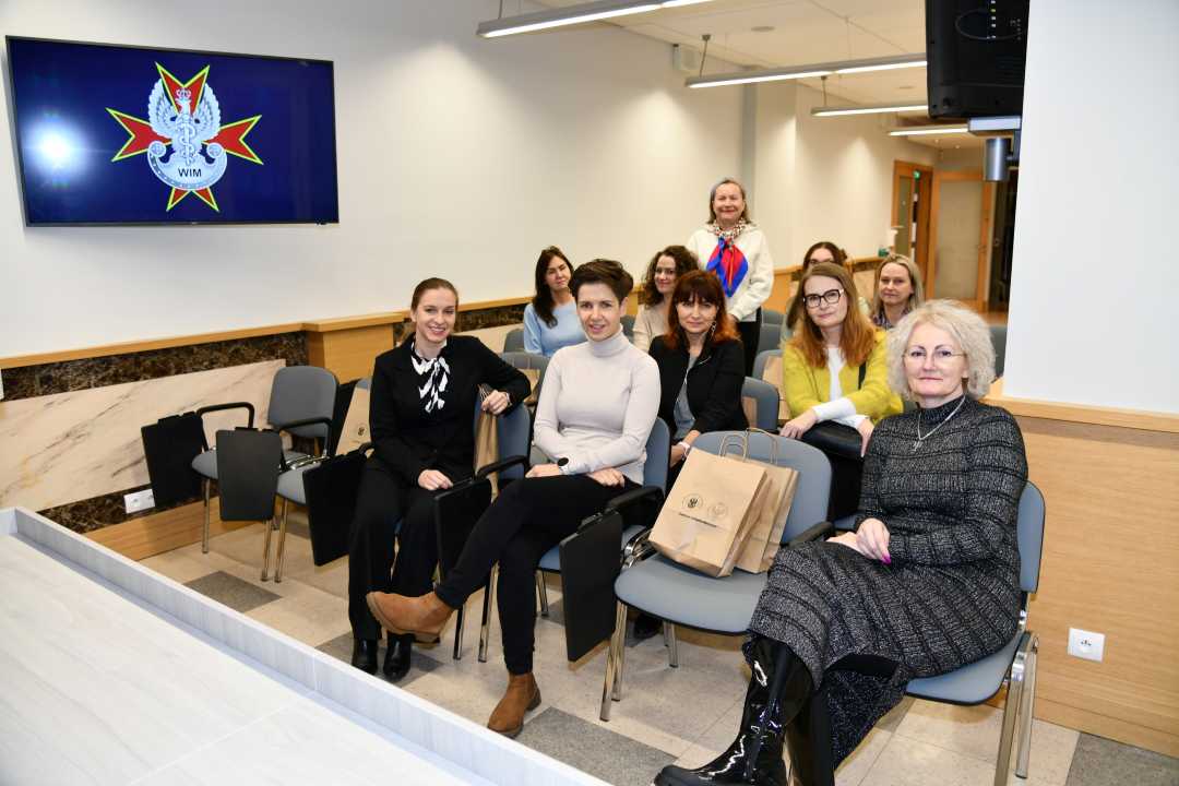 Uczestniczki spotkania w sali wykładowej.